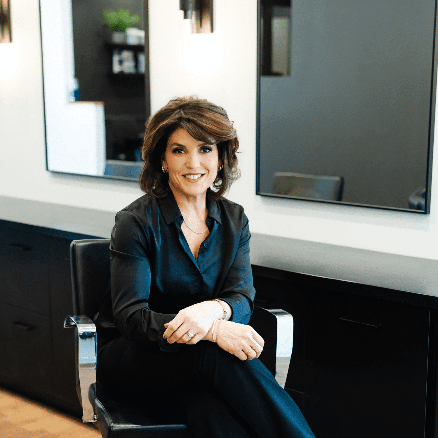 Portrait of Jody, a professional stylist at Avanté Salon & Spa, showcasing their expertise and style.
