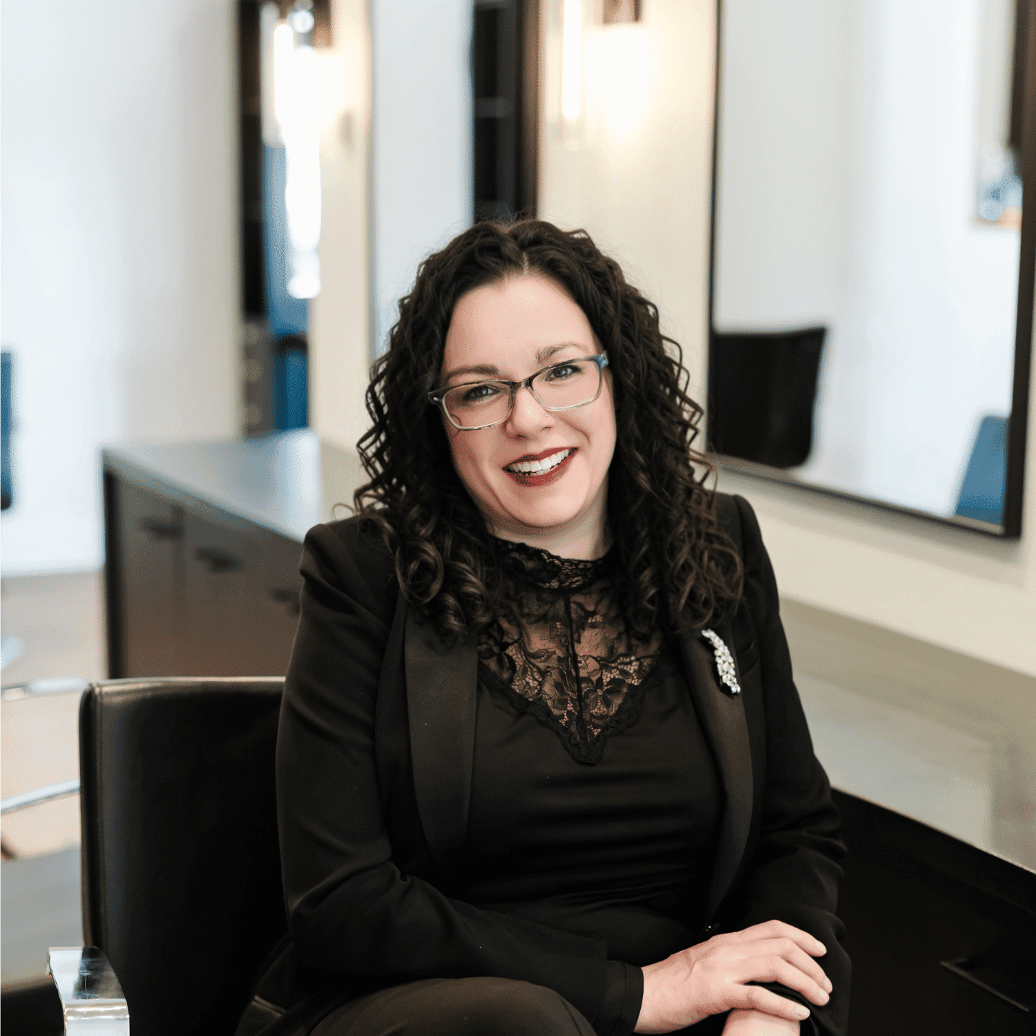 Portrait of Deirdre, a professional stylist at Avanté Salon & Spa, showcasing their expertise and style.